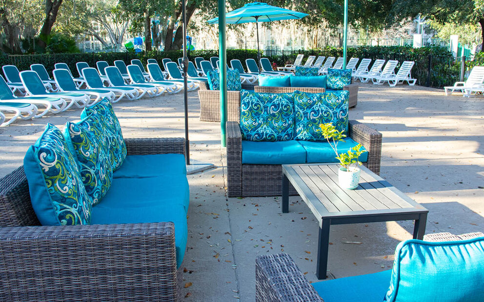 poolside lounge chairs and umbrellas