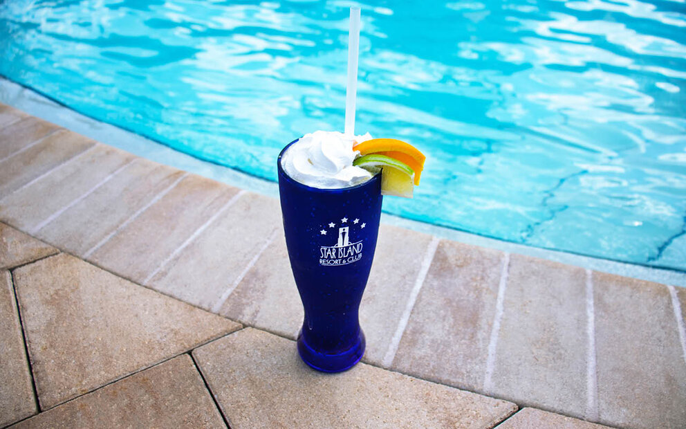 signature cocktail at poolside bar Star Island Resort